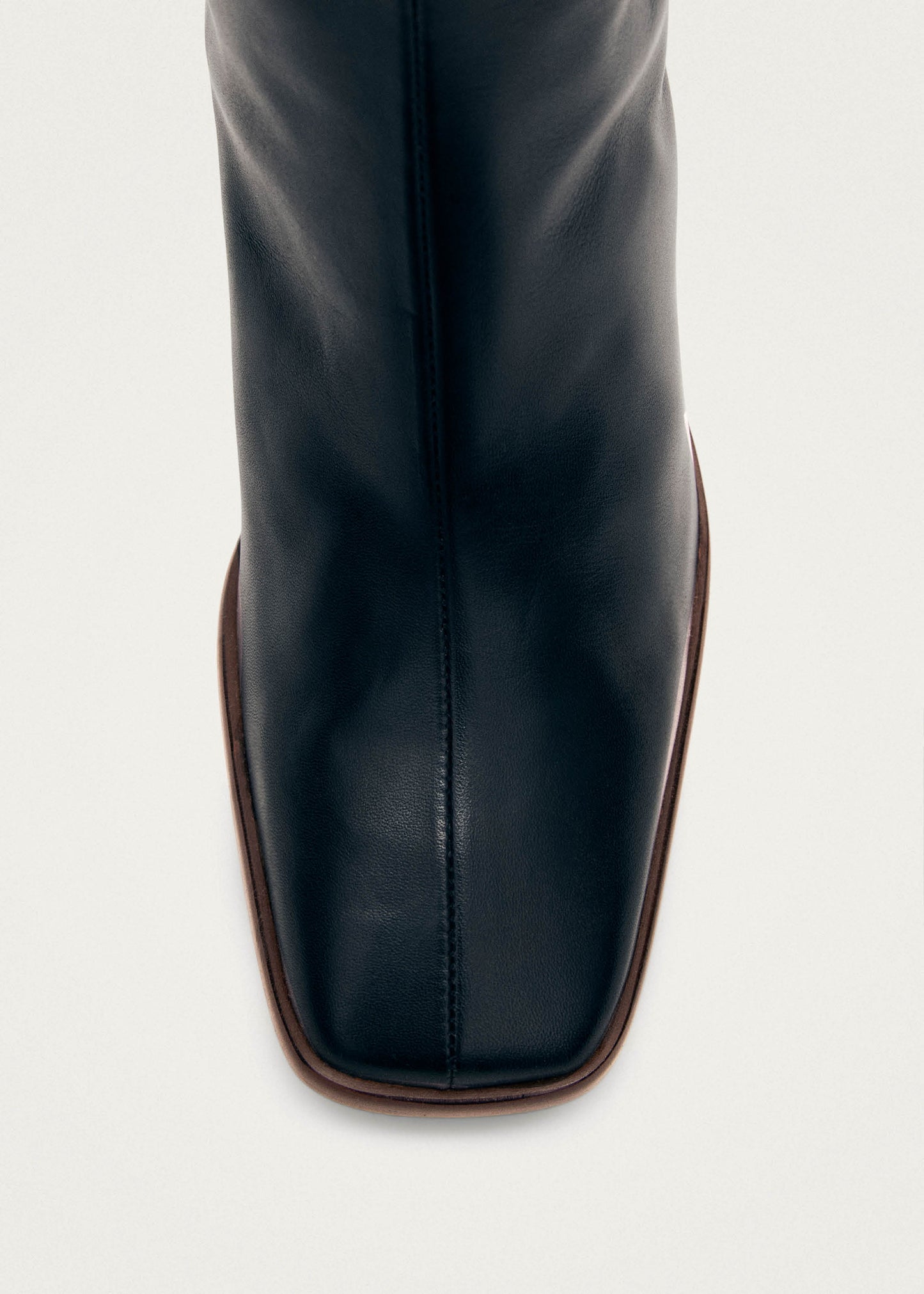 East Bottes en cuir noir