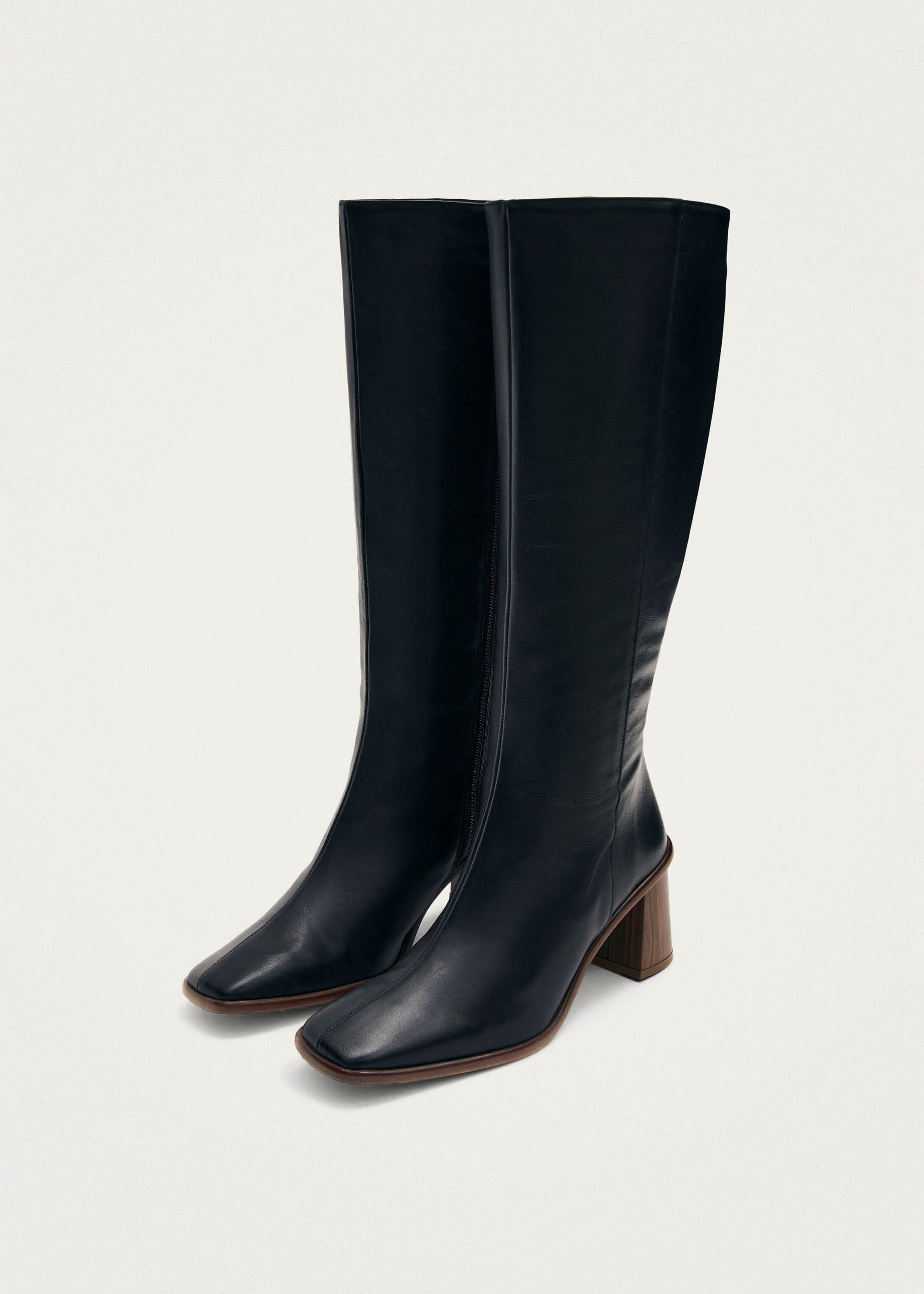 ALOHAS East black knee-high leather boots styled on model