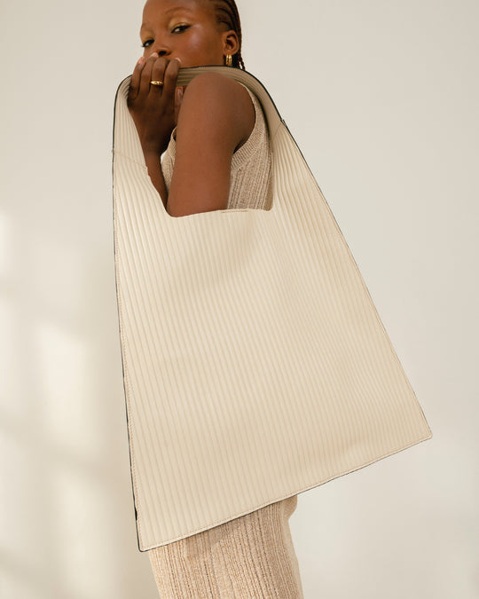 The L Pleated Cream Leather Tote Bag